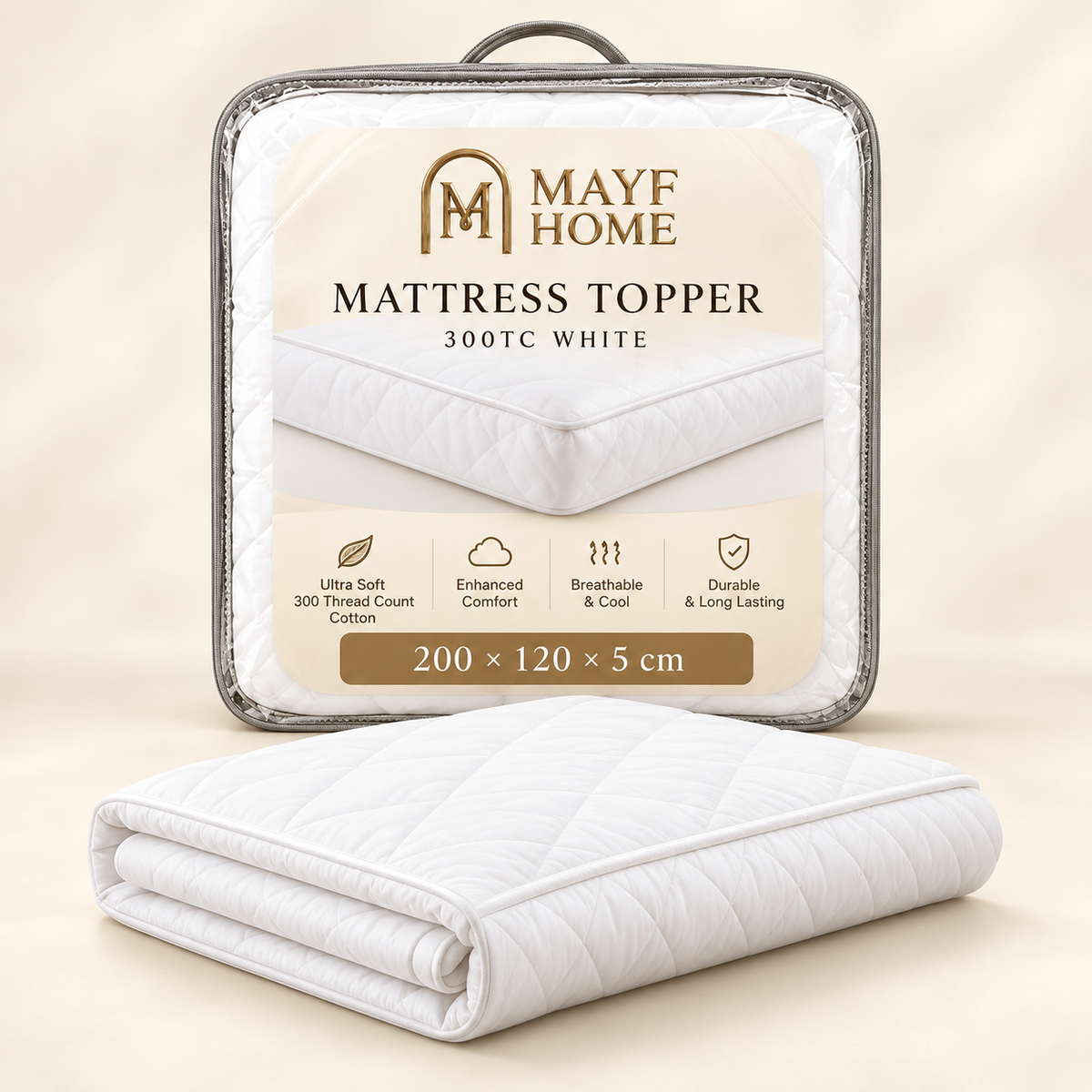 A folded white quilted mattress topper placed in front of its retail packaging. The package label reads MAYF HOME MATTRESS TOPPER 300T WHITE and shows dimensions 200 x 120 x 5 cm.