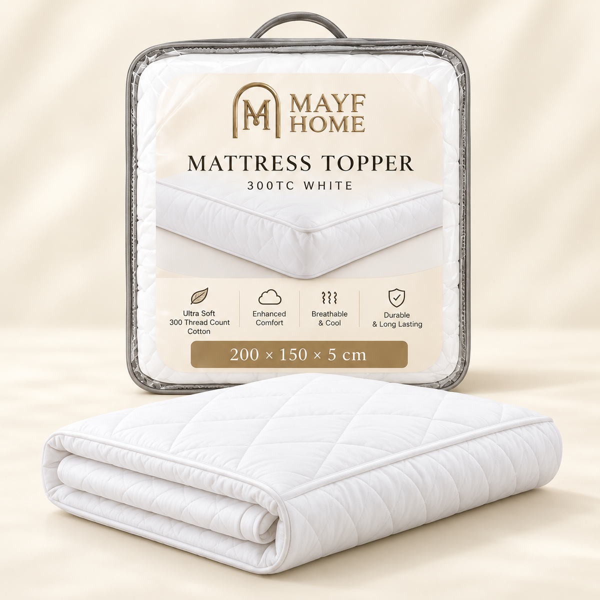 A folded white quilted mattress topper with a diamond-quilted pattern, shown in front of its clear plastic packaging box. The packaging features the brand name 'MAYF HOME' and text indicating it is '300TC WHITE' with dimensions '200 x 150 x 5 cm'.
